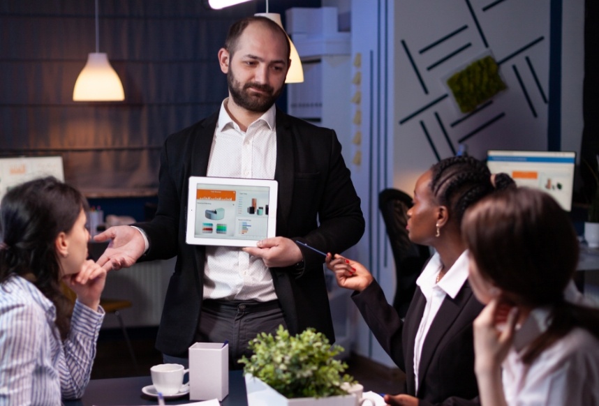 business-entrepreneur-man-presenting-company-statistics-using-tablet-financial-presentation